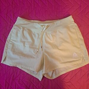 Reebok Women's Light Yellow Athletic Shorts